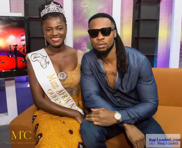 Flavour shares photo with beauty queen and asks his fans to caption the photo